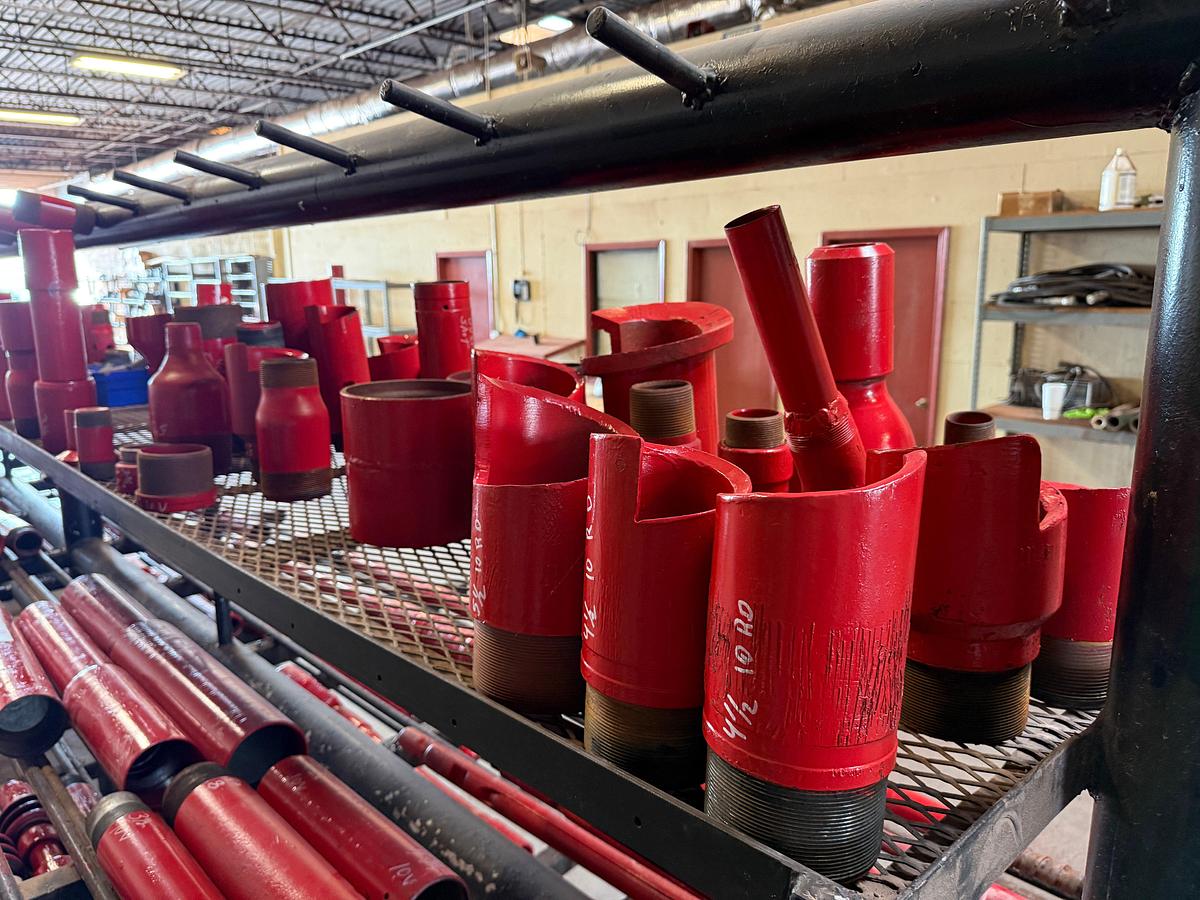 Used TOP RACK SHELF OF (30+) OVERSHOT CUT LIP GUIDES, SWAGES, COLLARS, SOME BOWLS & TOP SUBS