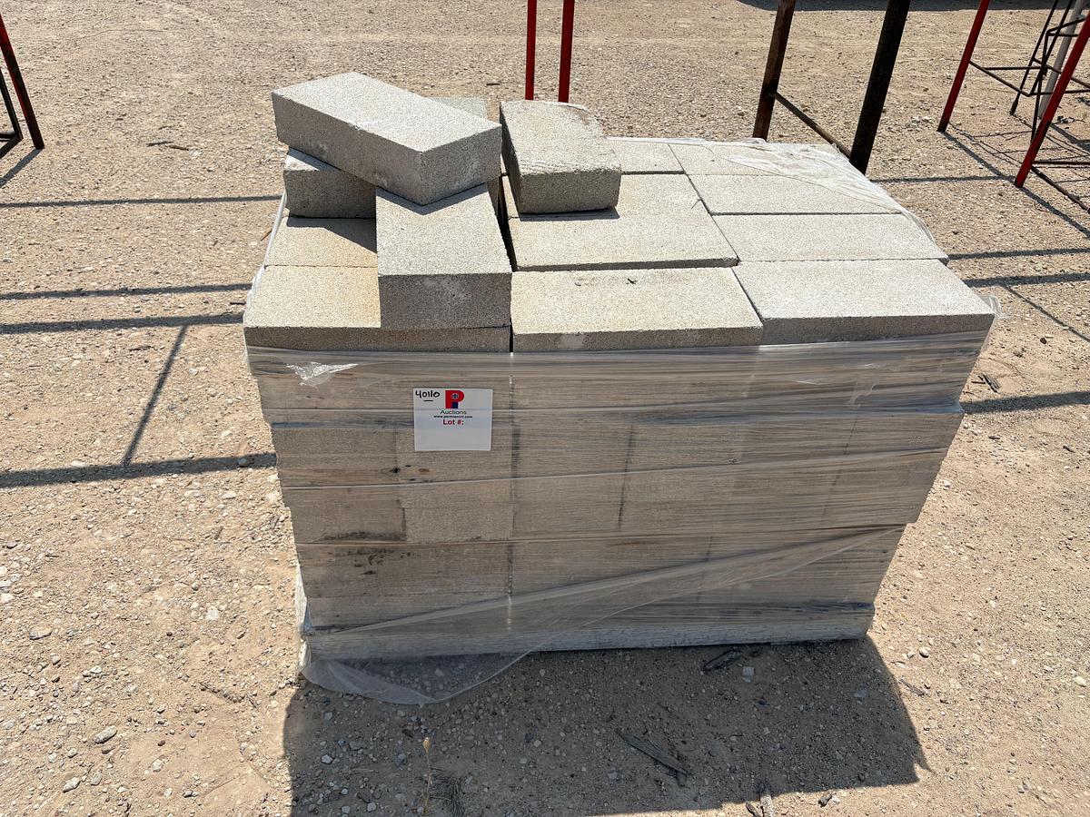 Used Pallet w/ (96) 15-1/2” x 7-1/2” x 3-1/2” concrete pavers