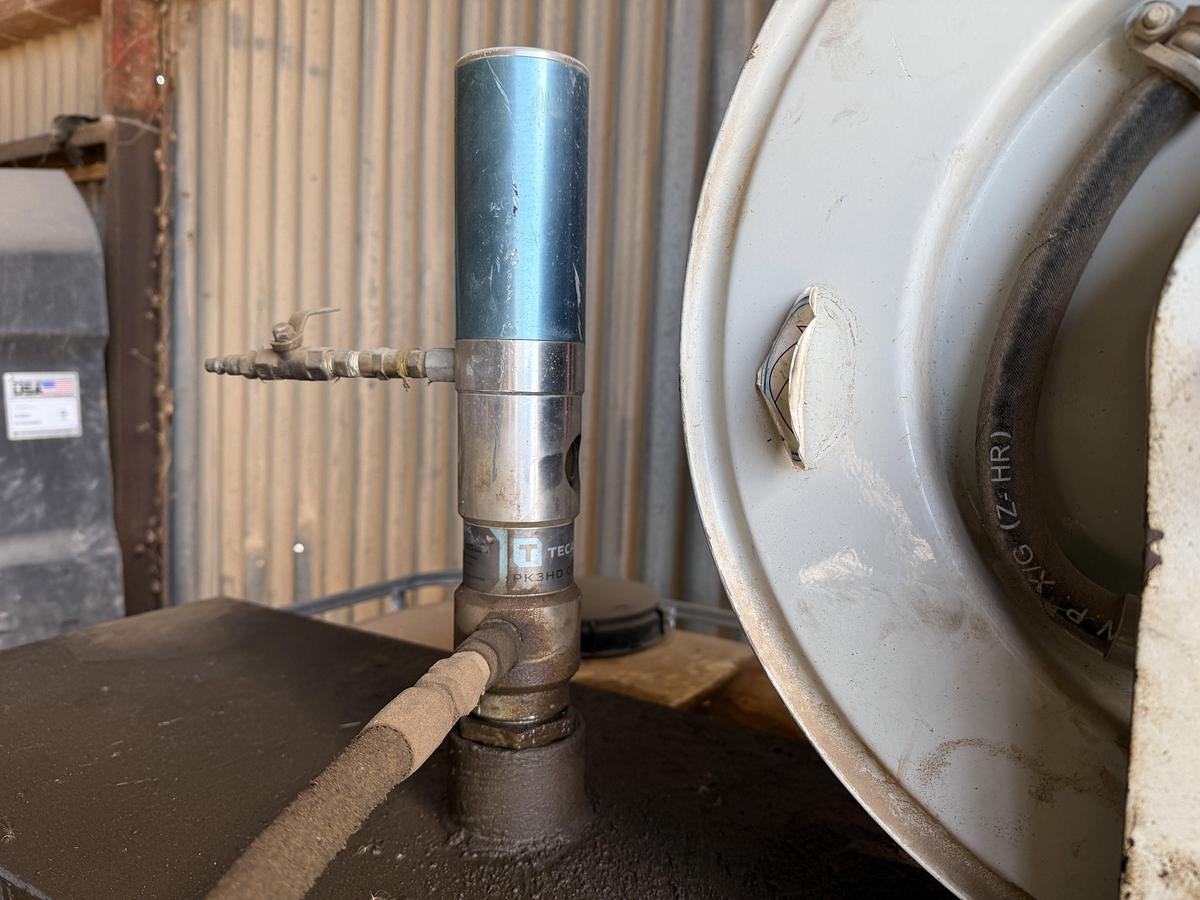 Used 44”L X 36”W X 40”H OIL TOTE W/ PNEUMATIC GUN HOSE REEL, & (2) OIL CATCH PANS