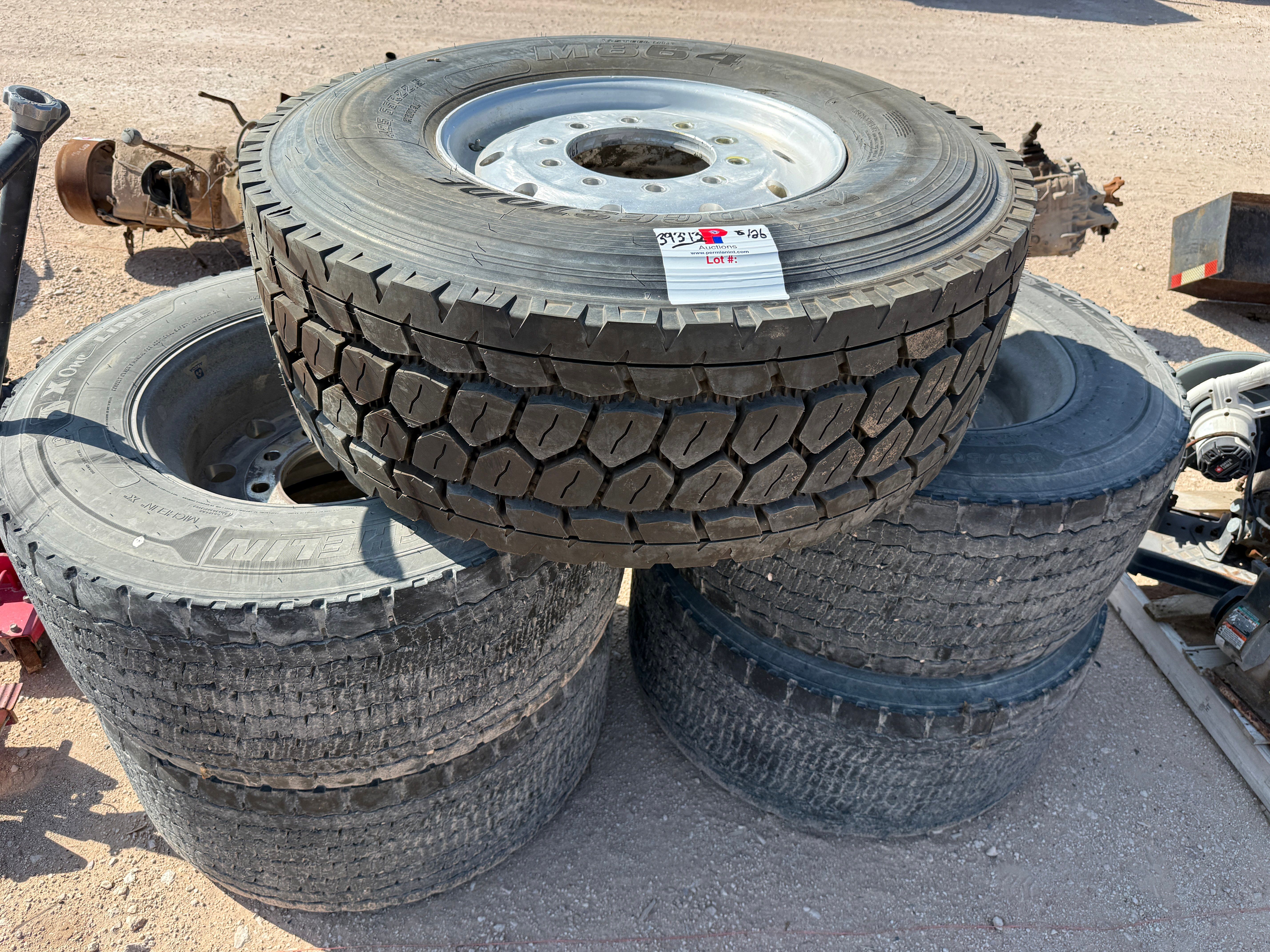 Used (1) (UNUSED) BRIDGESTONE 425/65R22.5 & ALUM WHEEL & (4) MICHELIN 445/50R22.5 SUPER SINGLES W/ ALUM WHEELS