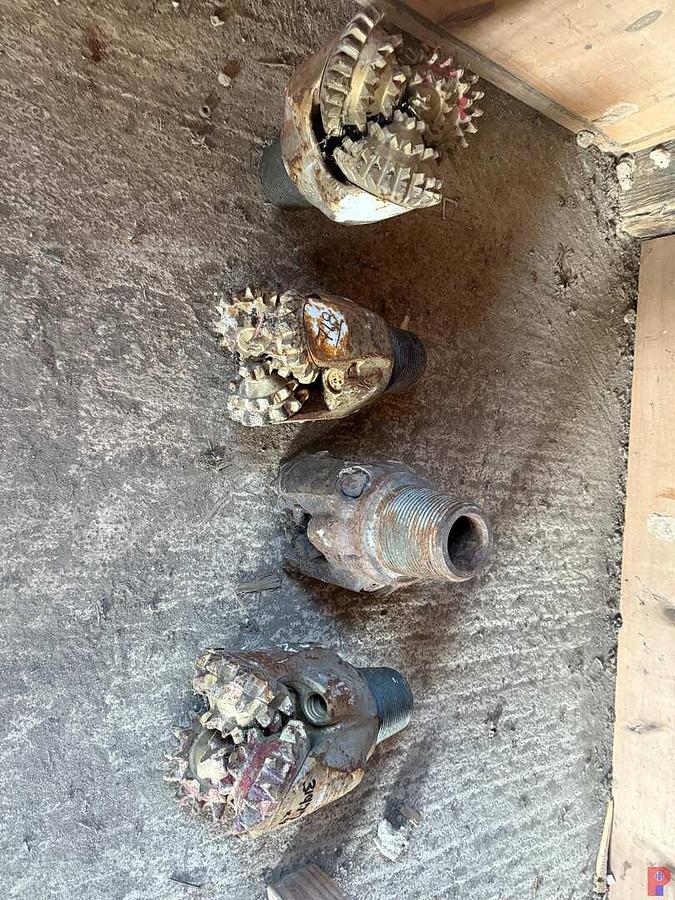 Used (4 X $) ROW OF 7-1/2” - 8-3/4” OD X 4-1/2” THRD. TRICONE DRILL BITS