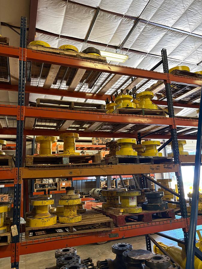 Used (4 shelves) w/ assorted 4” to 7” spools, single stud adapters, & 5” 10k blind flanges