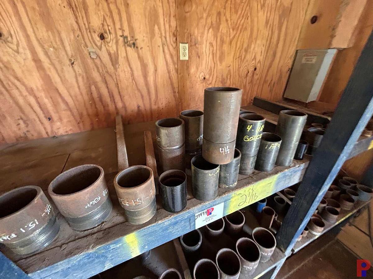 Used 2-SHELVES W/ (60 +) 1-1/2” - 8” STEEL THREAD PROTECTORS