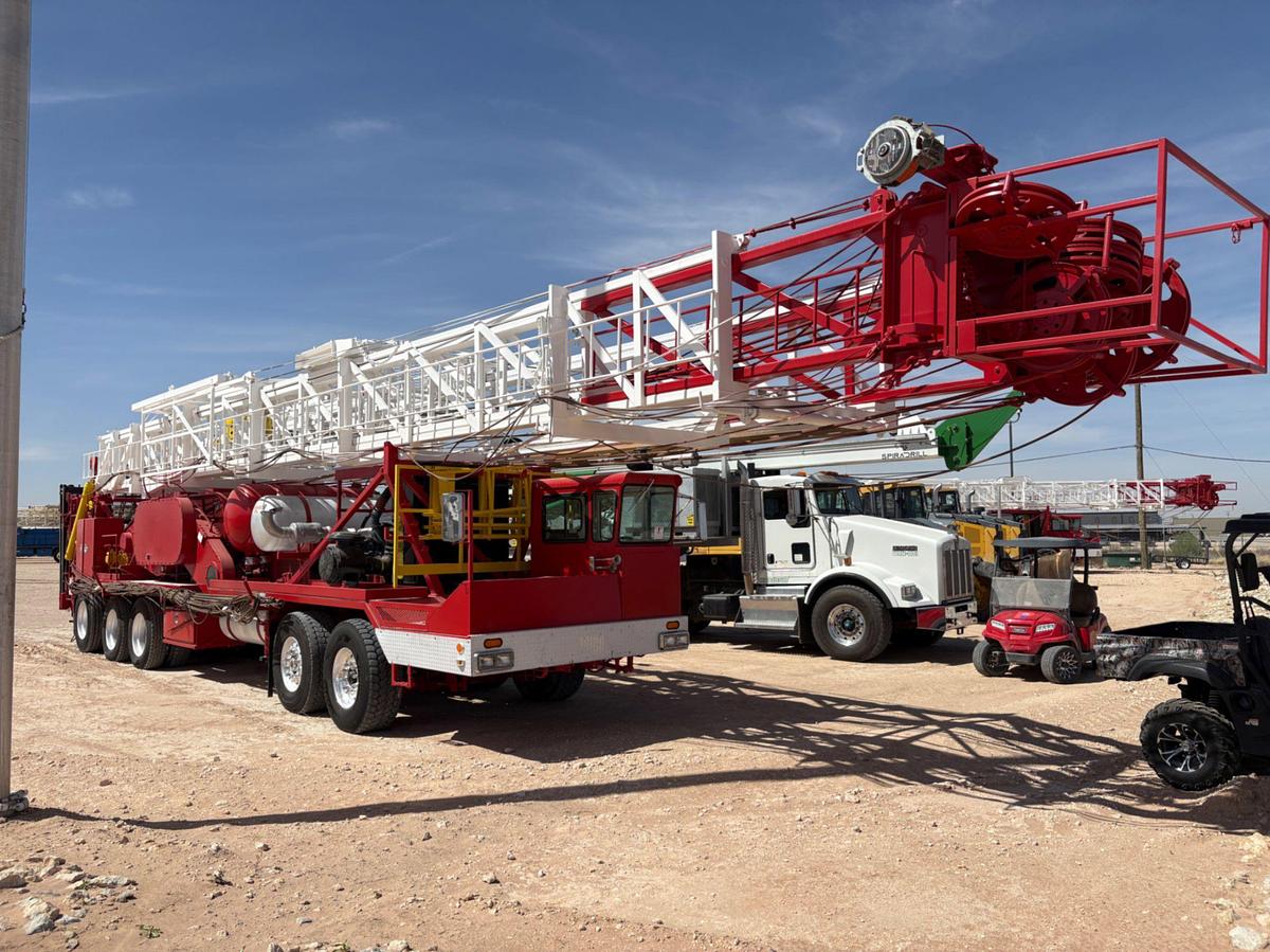 Used 2012 RIG WORKS MUSTANG DOUBLE DRUM 5-AXLE WELL SERVICE RIG (104'x275k Mast)