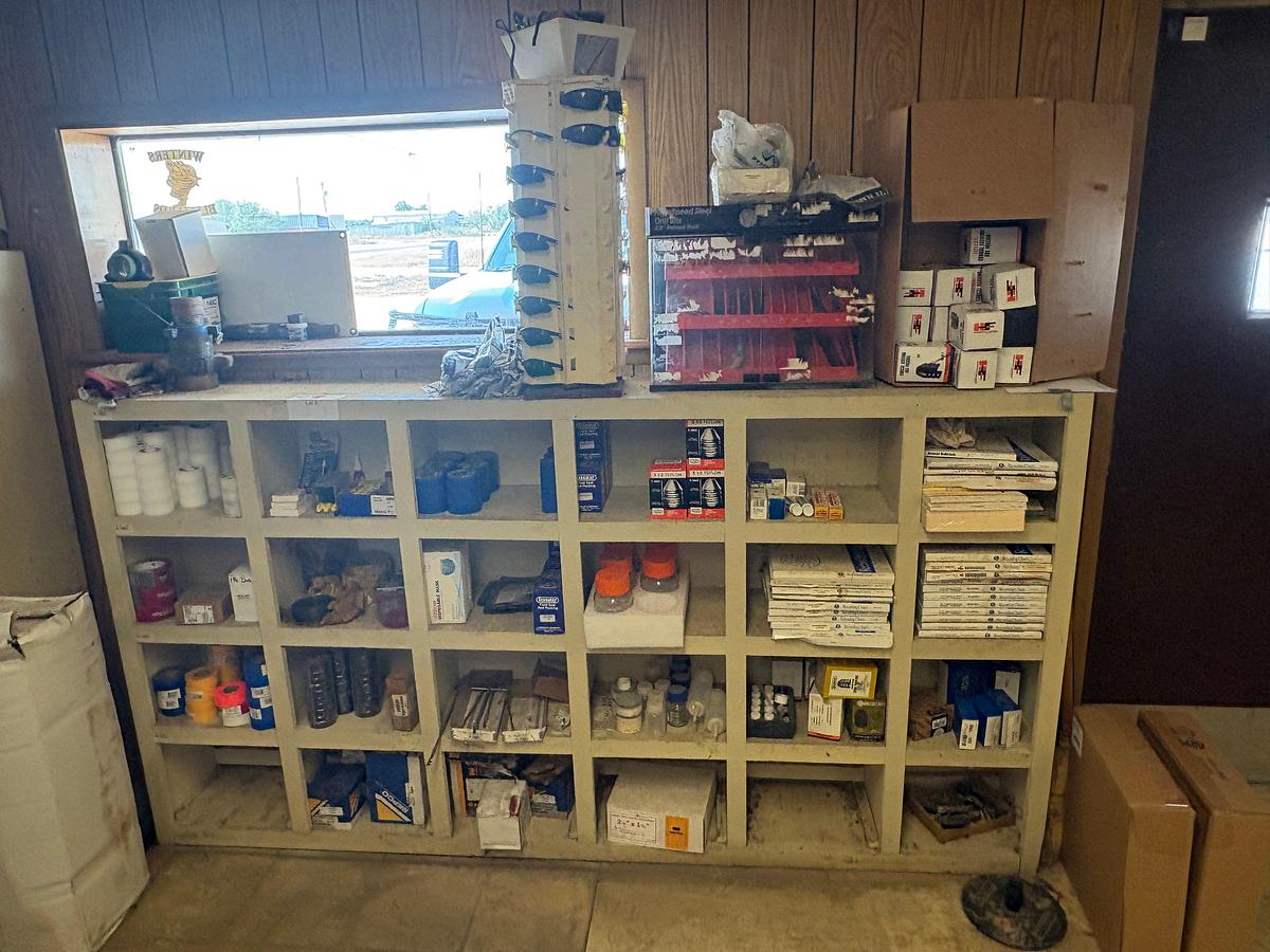 Used 18-bin shelf w/ contents