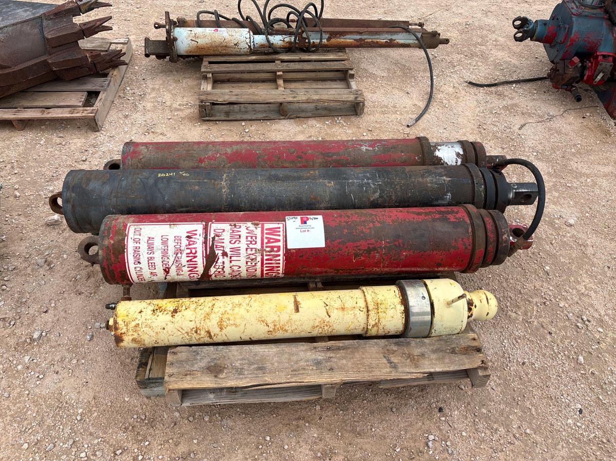 Used (4) hydraulic raising rams
