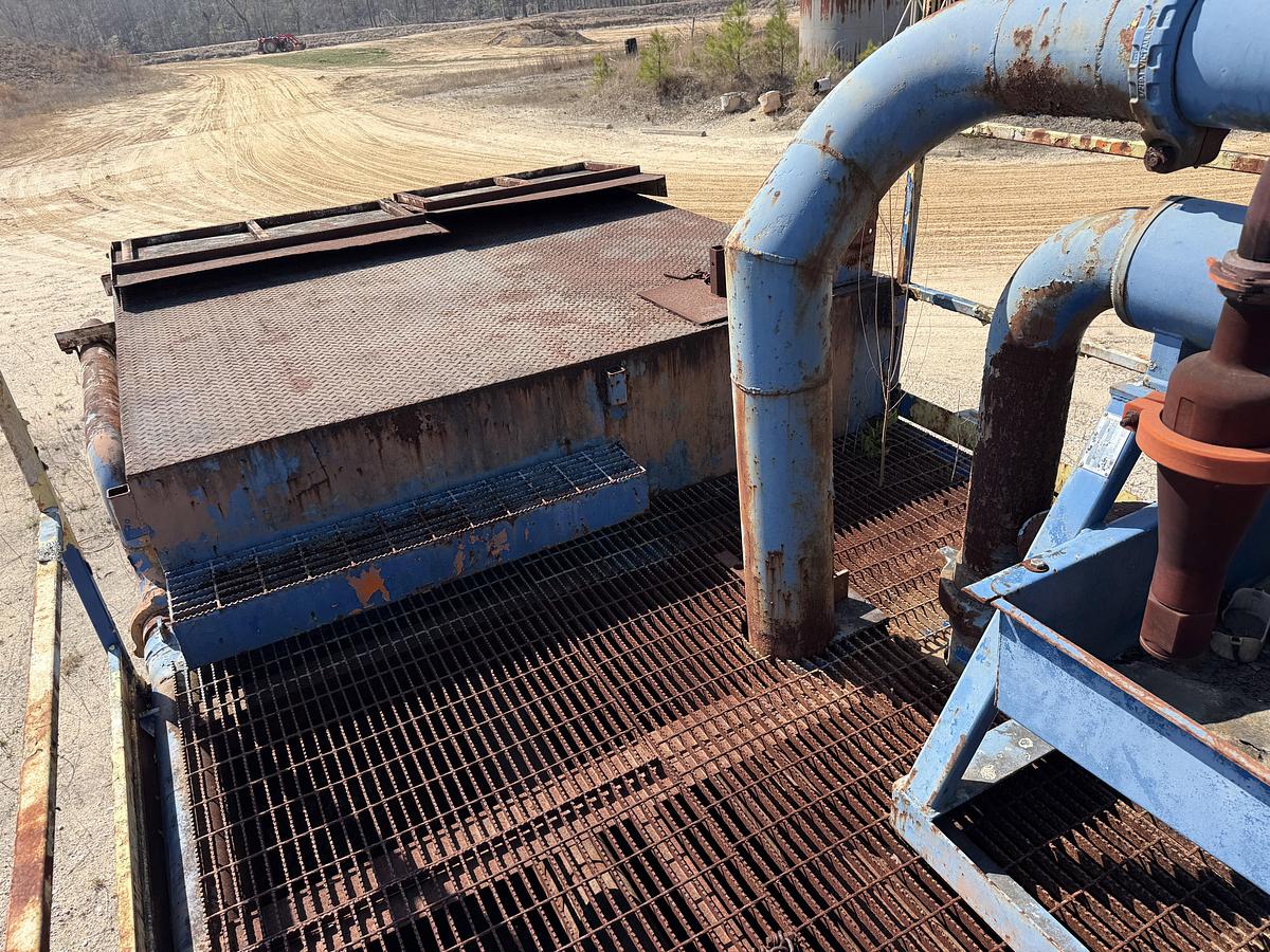 Used 40'L X 7.6'W X 5'H MUD TANK W/ 6X5 CENTRIFUGAL PUMP P/B 50-HP ELECTRIC MOTOR