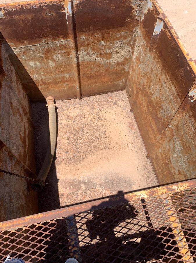 Used 21’ L x 9’ W x 8’ T 115 Bbl Open Top Skidded Tank