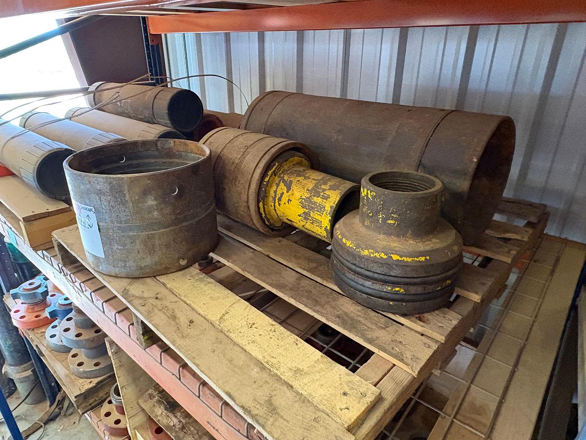 Used Contents of (4 shelves) w/ (65) assorted 2” to 4” weco flanges, casing hangers, & (38) 7” casing pup jts