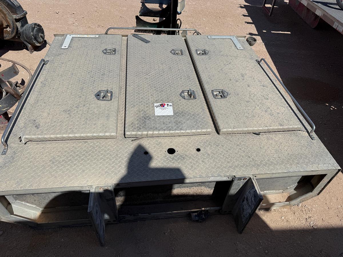 Used 6.8’W x 6’H x 1.6’D 3-DOOR ALUMINUM HEADACHE RACK