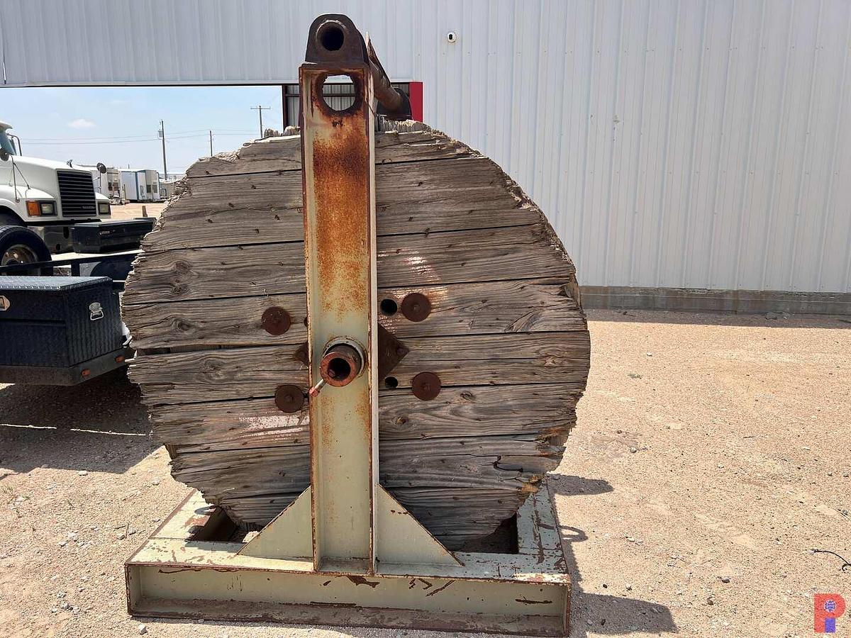 Used SPOOL STAND WITH 5’6” DIAMETER SPOOL 1/4 FULL OF 1” DRILL LINE