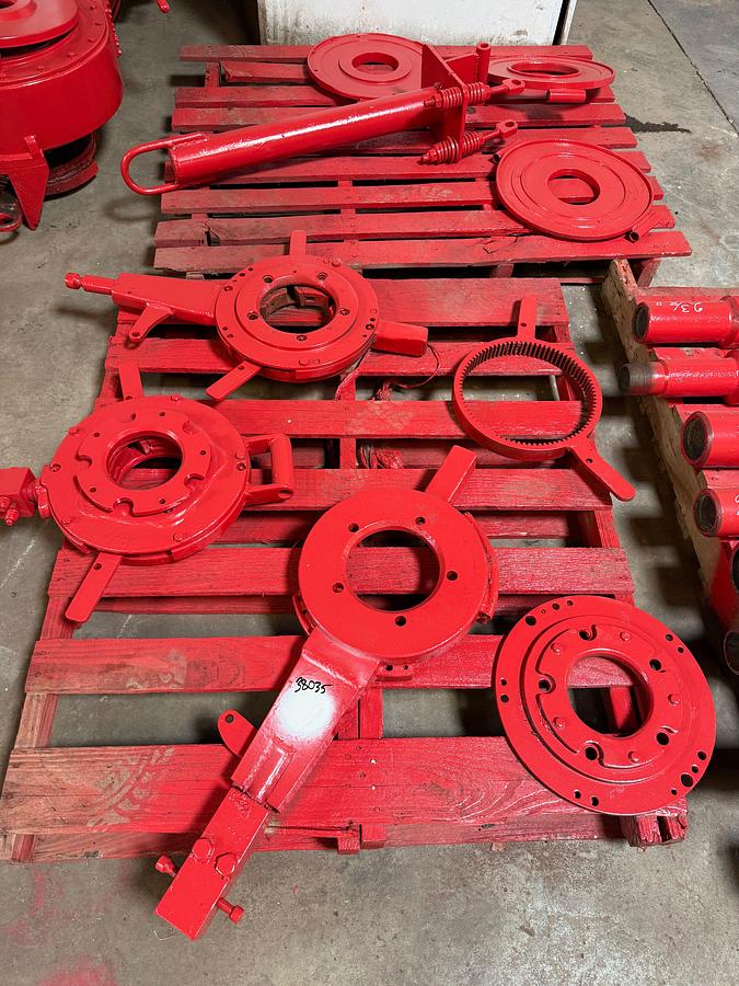 Used (2) PALLETS W/ TONG BACKUPS, HANGING BRACKET, & TOP PLATES