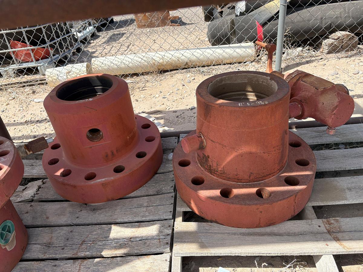 Used (2) 11”5k x 9-5/8” casing heads w/ (2) 11” multi bolt heads