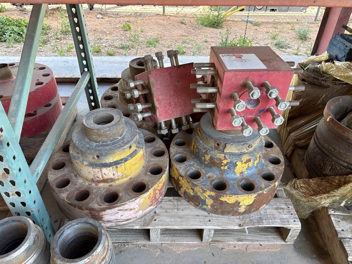 Used (4) assorted landing flanges & (2) 2” 4-way fluid crosses