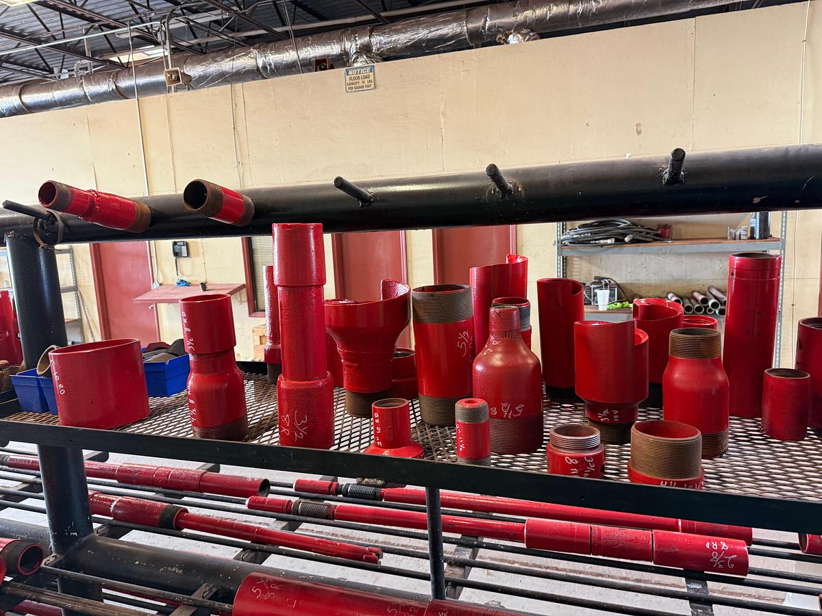 Used TOP RACK SHELF OF (30+) OVERSHOT CUT LIP GUIDES, SWAGES, COLLARS, SOME BOWLS & TOP SUBS