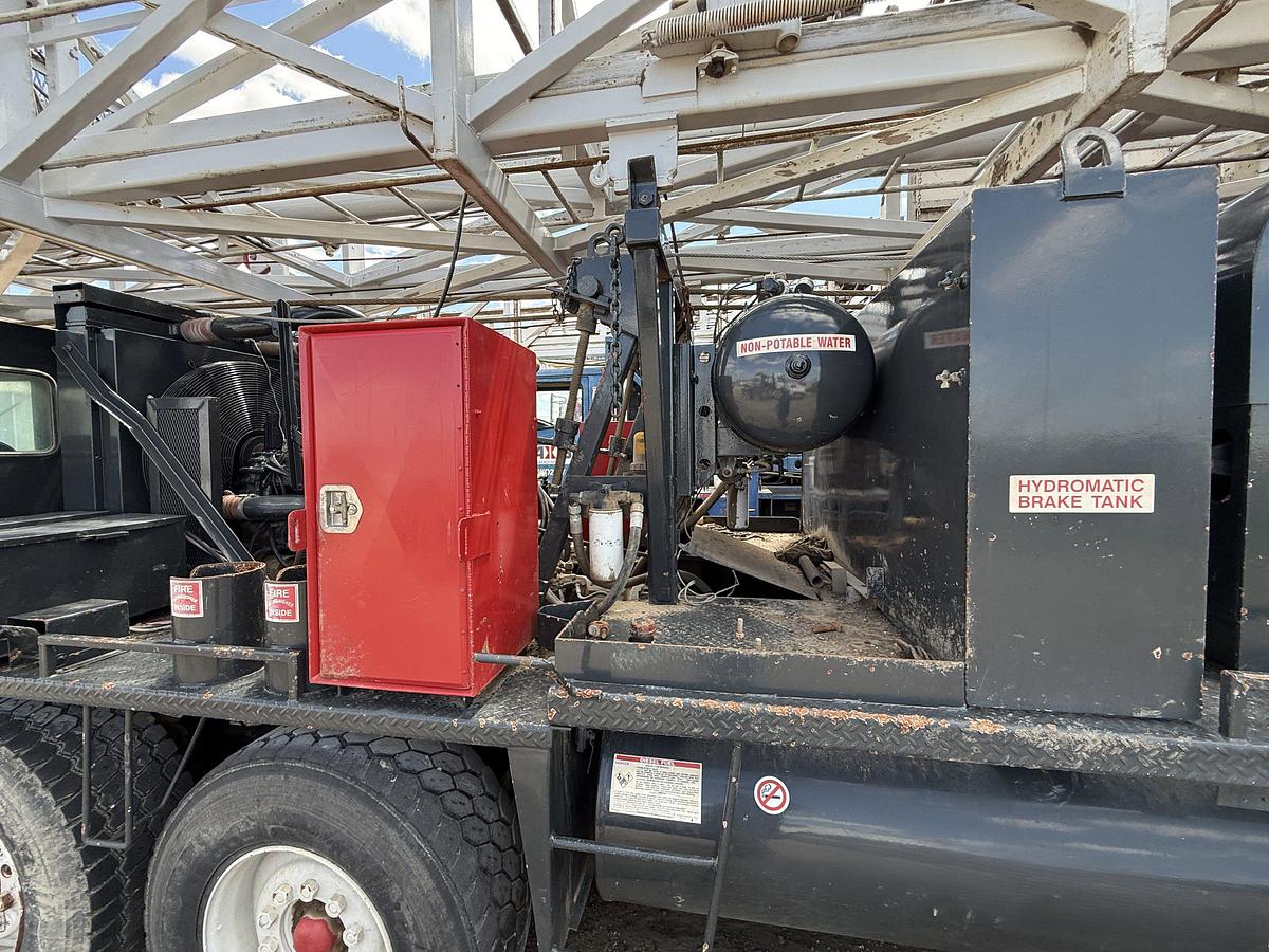 Used FRANKS EXPLORER III 96’-215K 4-AXLE WELL SERVICE WORKOVER RIG