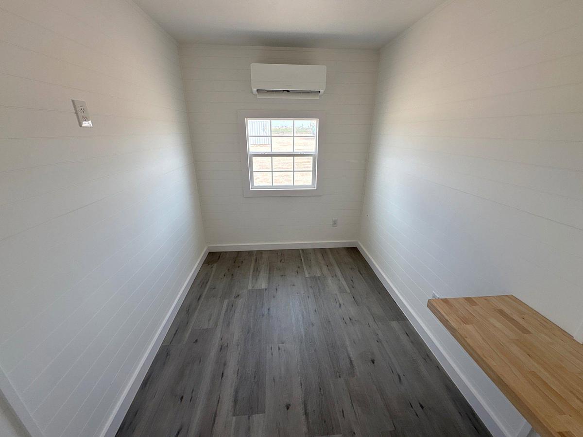 Used 40’ x 8’ x 9’6” sea container converted into living quarters