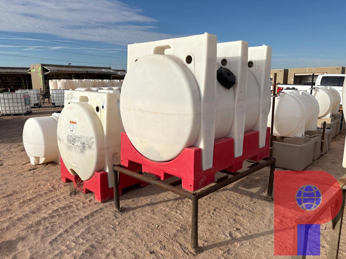 Used (2) 550 GALLON POLY TANKS W/ STORAGE RACKS
