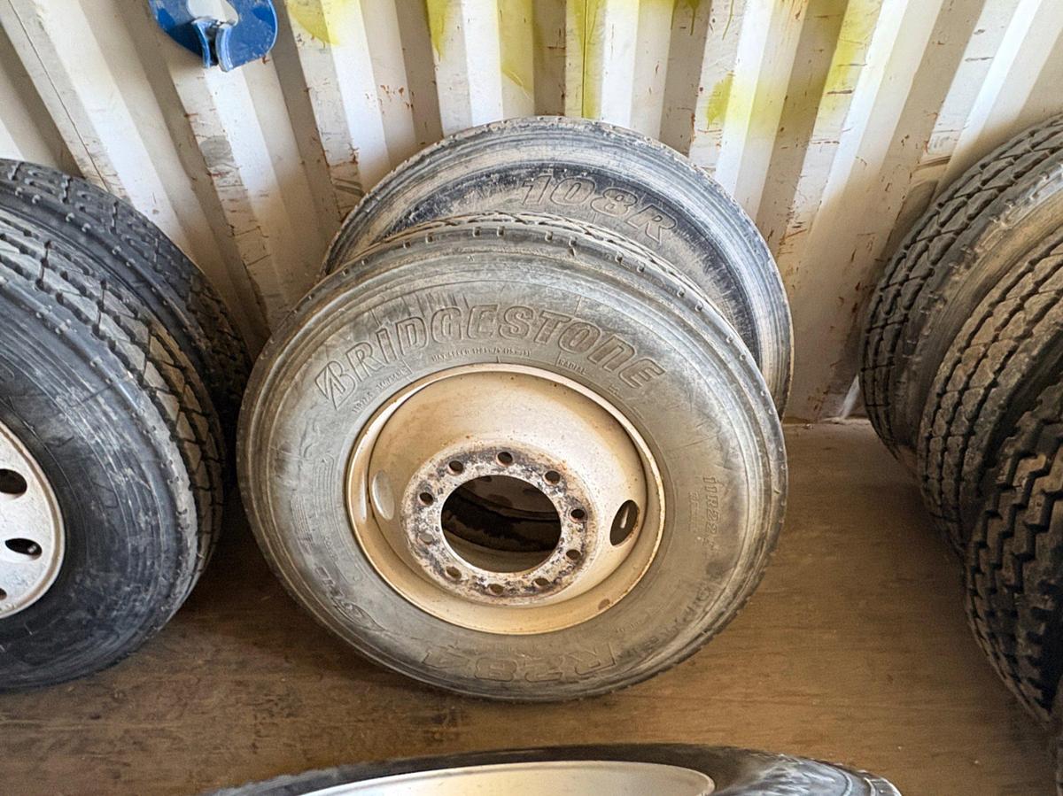 Used (4) 11R24.5 tires w/ 10-lug wheels & (1) 275/80r22.5 tire w/ 10-lug wheel