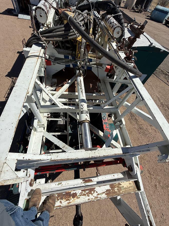 Used 2006 SJ PETRO XJ450 105’-303K LBS. 5-AXLE MOBILE DRILLING RIG