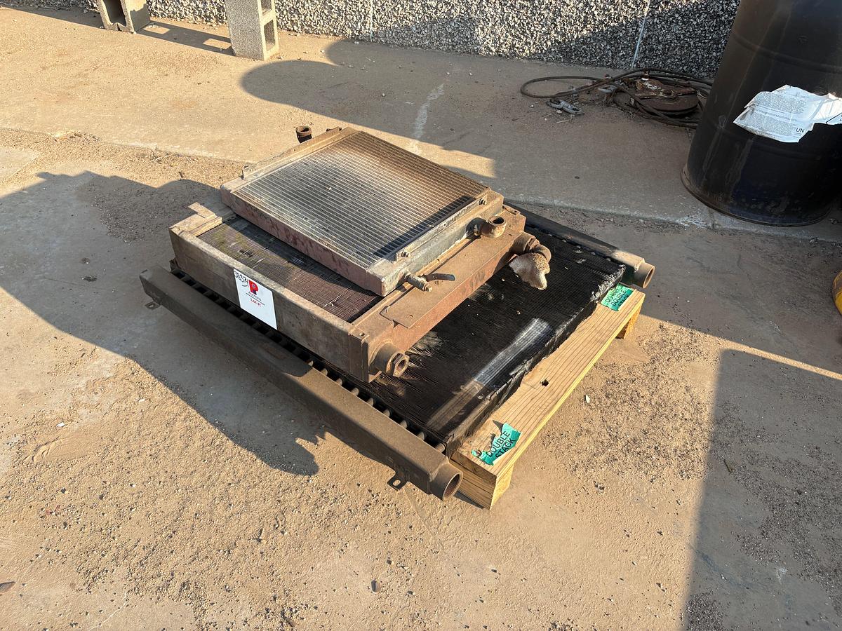 Used (4) assorted size oil coolers/radiators