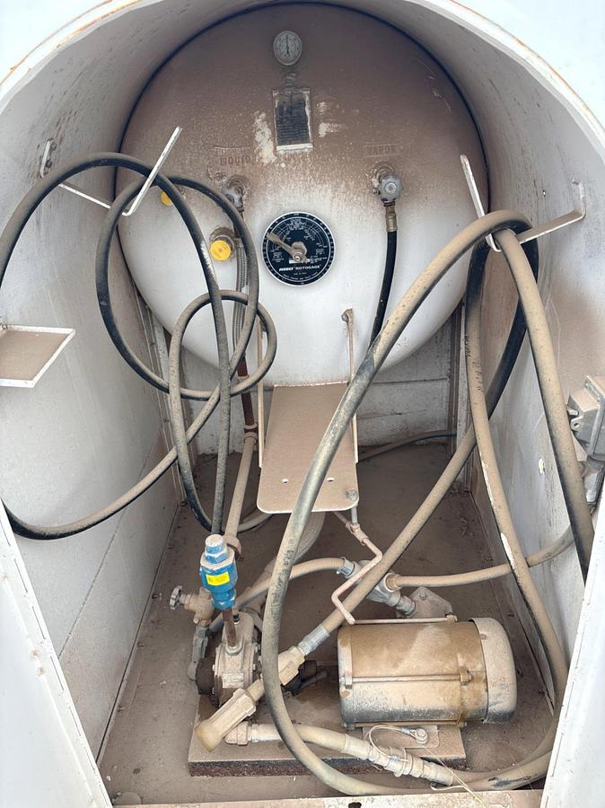 Used 18’ x 3.5’ x 70” 1,000 gallon propane tank, skidded