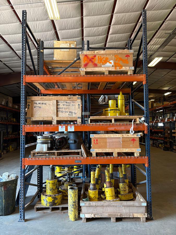Used Contents of (4 shelves) w/ Assorted 4” & 7” frac valve parts & casing hangers