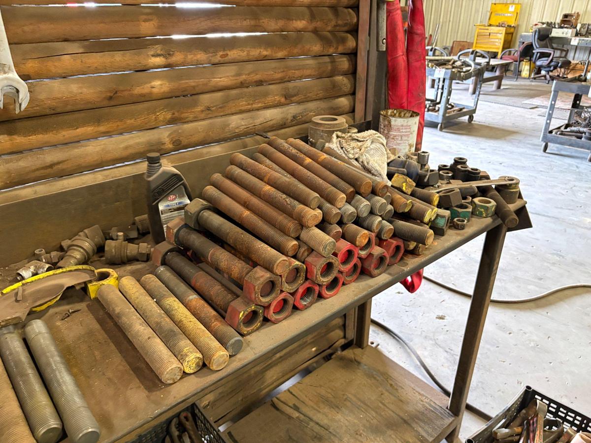 Used 8’ x 2’ x 3.5’ metal workbench w/ contents