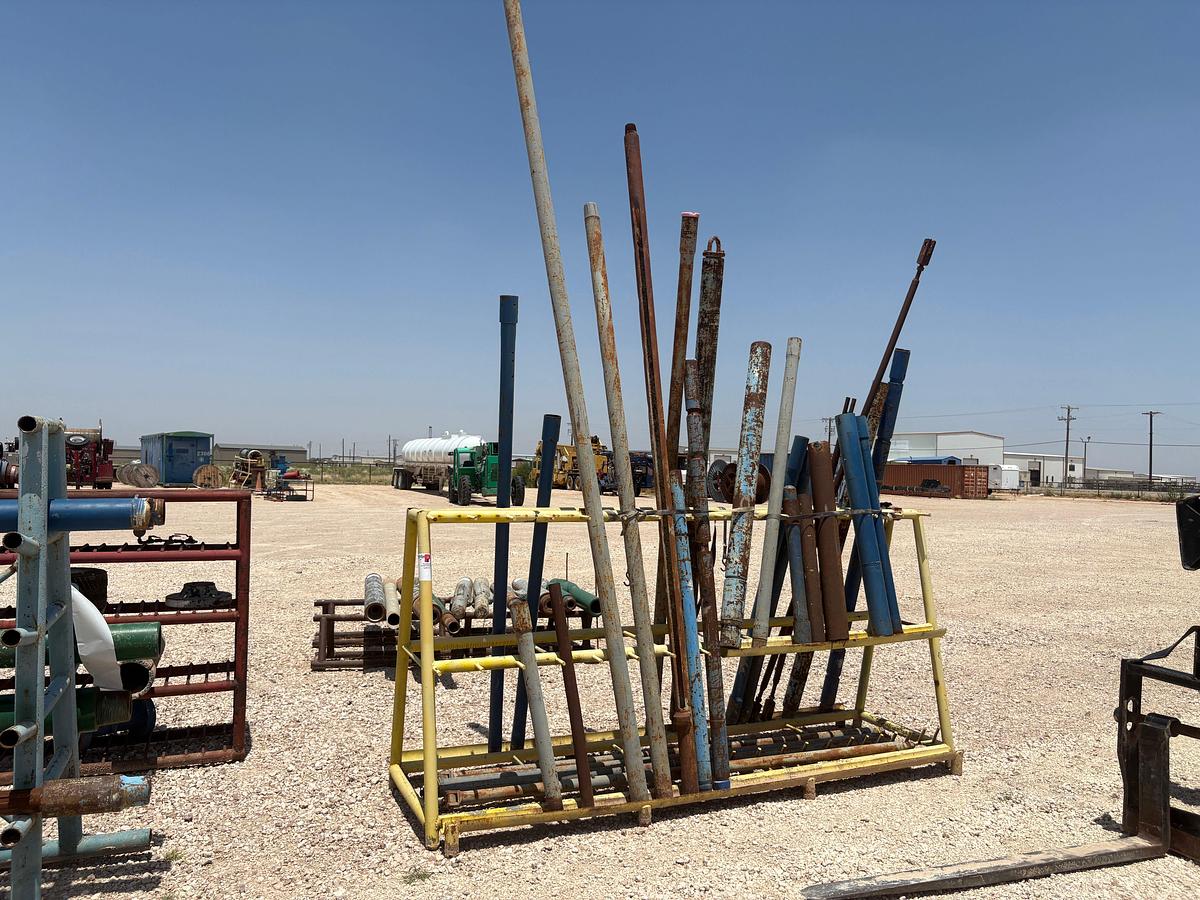 Used 10’ x 3.5’ x 5’ A-frame tool rack W/ assorted tubing pup jts, drain subs, stock pipe, etc.
