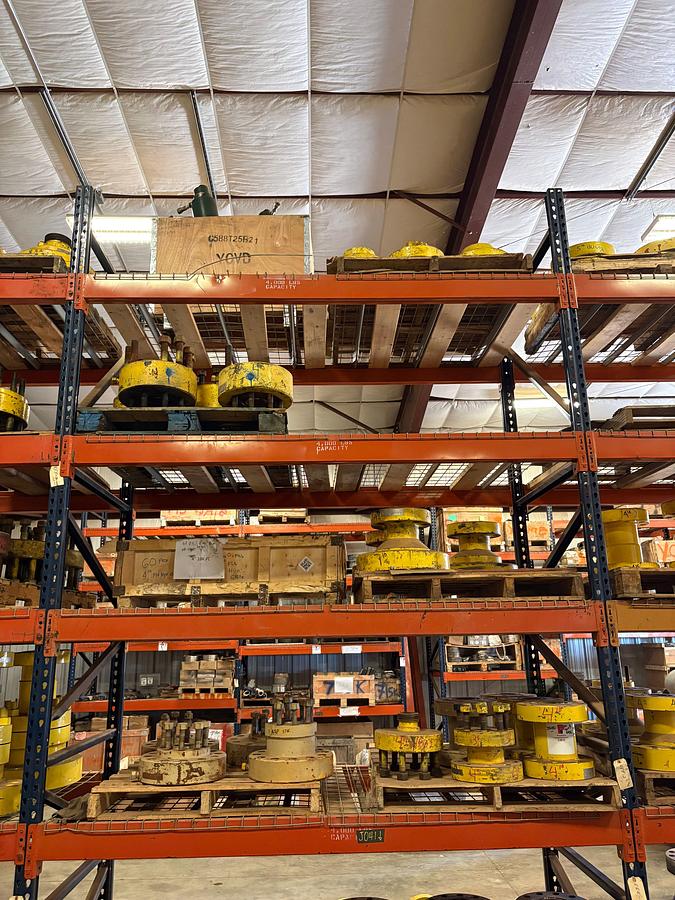 Used (4 shelves) of assorted single stud adapters, 4” to 7” spools, hydraulic valve actuators, etc