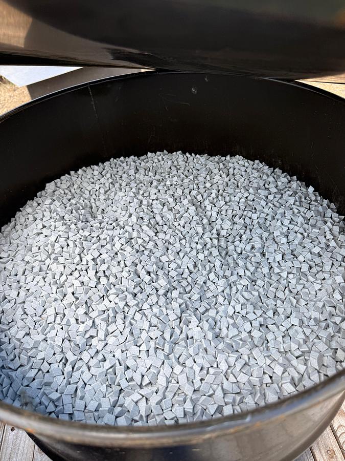 Used (3) 55 gallon drums of Triangular Ceramic Abrasive Polishing Tumbling Media. Approximately 700 lbs. in each drum.