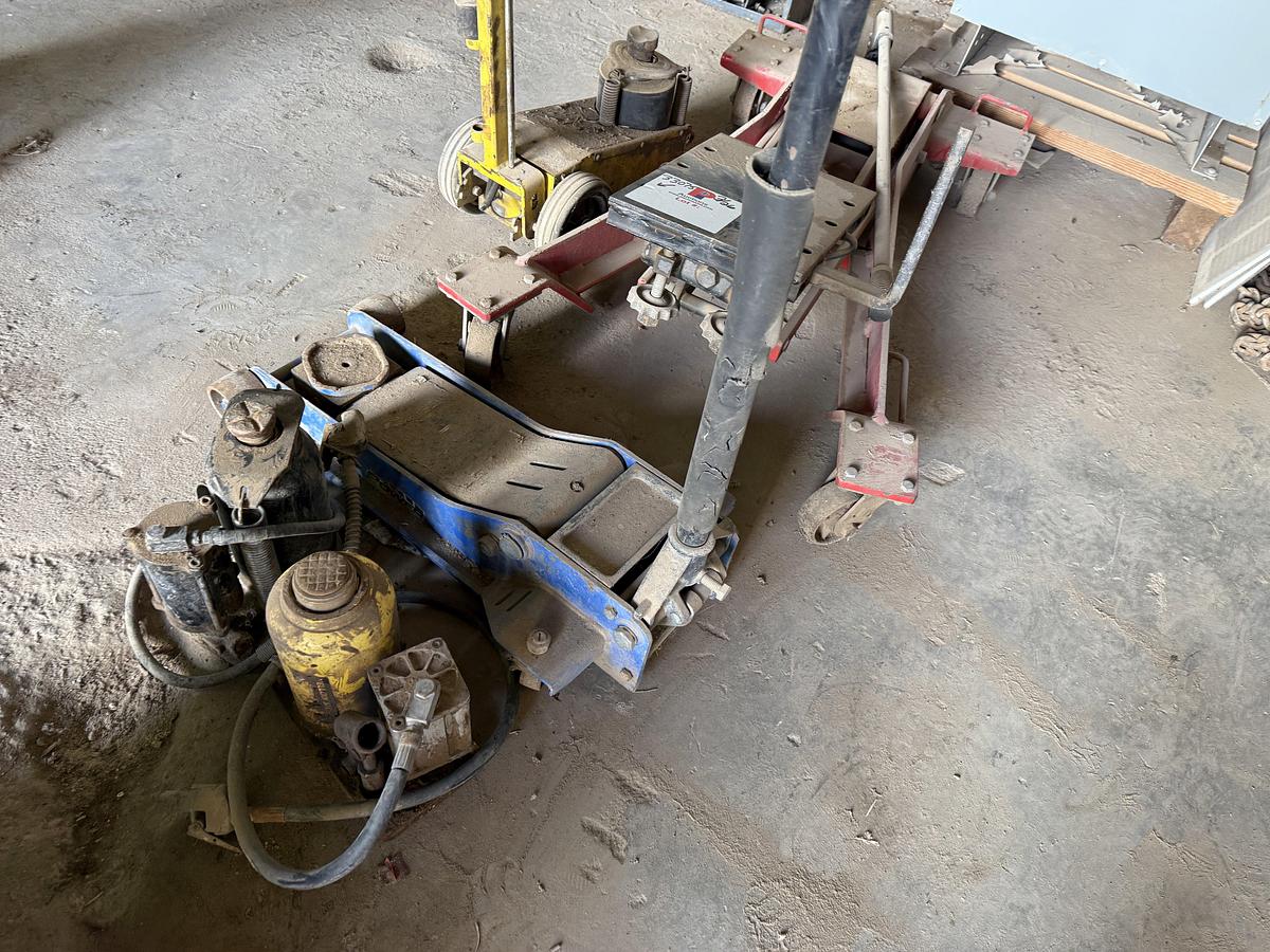 Used (1) TRANSMISSION JACK, (1) FLOOR JACK, (3) PNUEMATIC BOTTLE JACK, (6) JACK STANDS