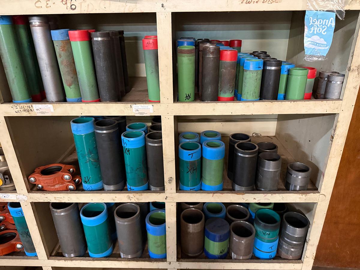 Used SECTION OF MOSTLY HEAVY WALL PVC & STEEL FITTINGS, VICTAULIC COUPLERS, SWAGES, COLLARS, NIPPLES, (3) 2” JAYCO VENT VALVES