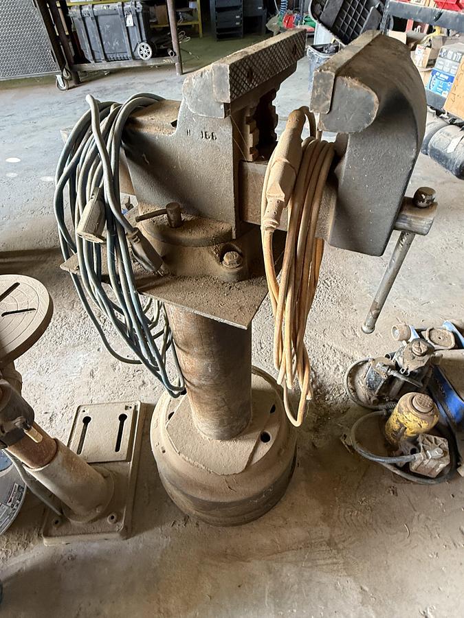 Used (1) WILTON VICE MTD ON STAND, (1) ELECT. 13” DRILL & (1) 20 TON BOTTLE JACK PRESS, (1) PROPANE BOTTLE & TORCH, BATTERY CHARGER