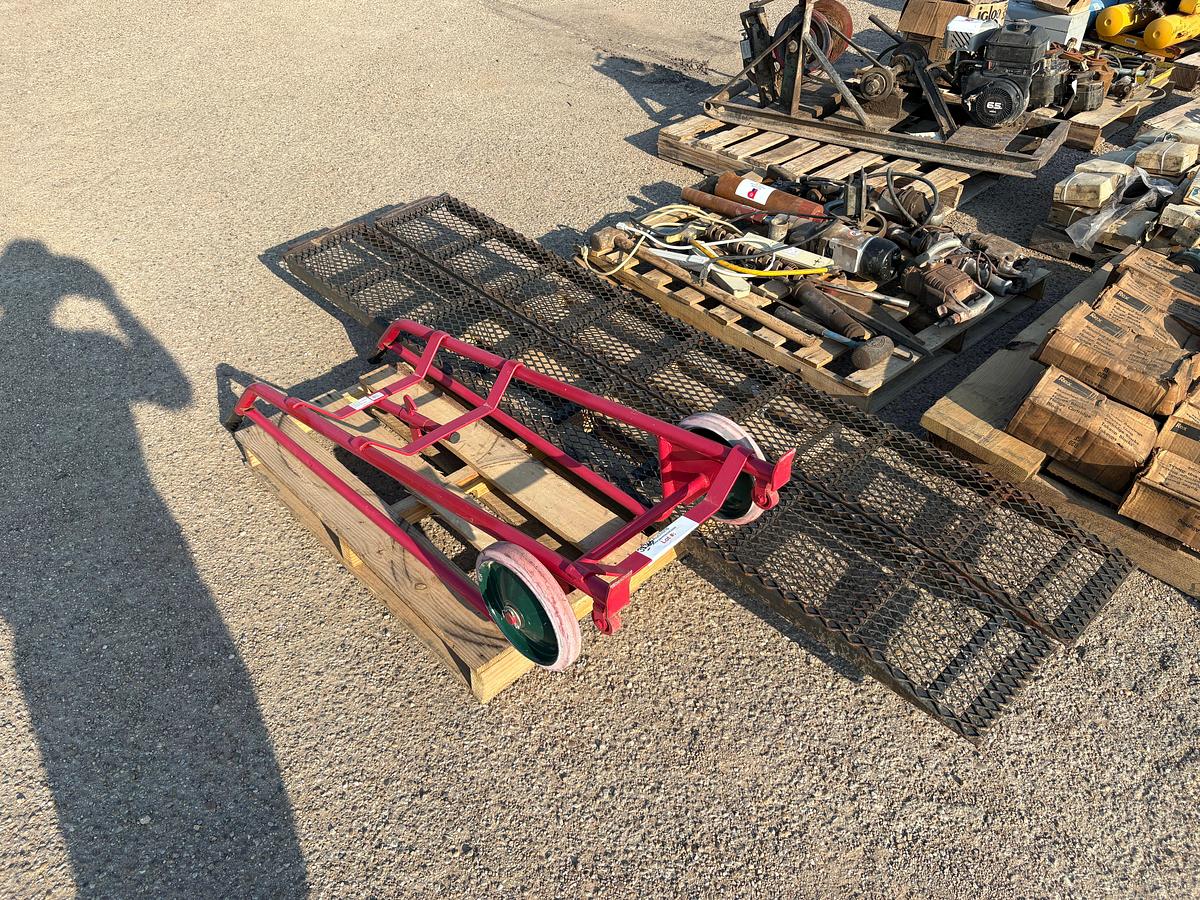 Used Northern tool barrel dolly & set of (2) 8’ x 1’ trailer ramps