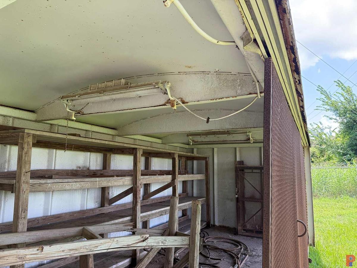 Used 24’L X 10.6’W X 9’H SKIDDED DOGHOUSE W/ OPEN SIDE SLIDING DOORS