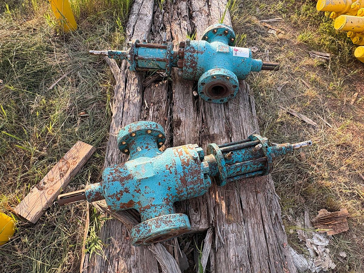 Used (2) 4-1/16” 10k hydraulic gate valves, (10) 2-9/16” gate valves, & (3) single stud adapters
