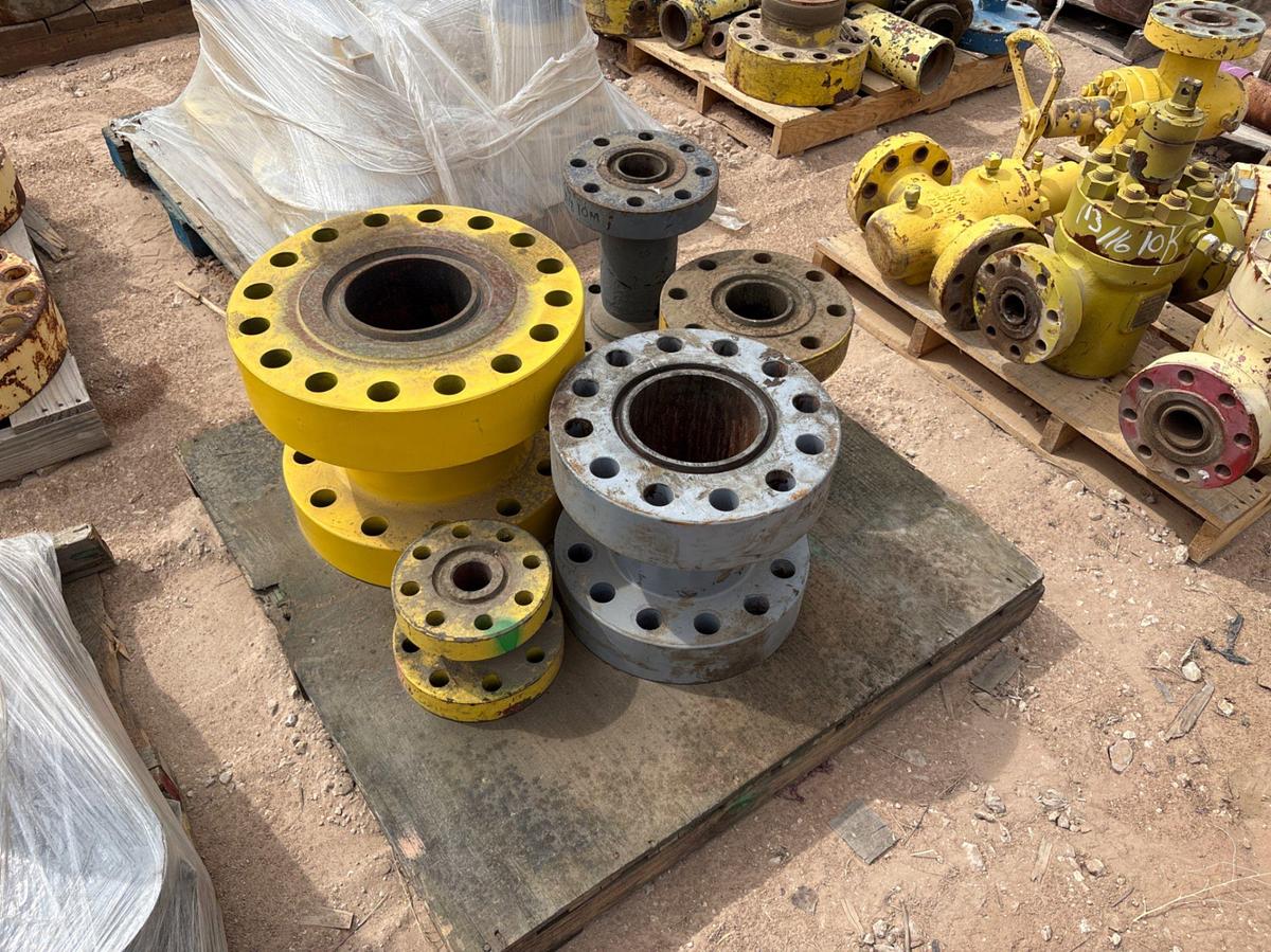 Used (9 pallets) assorted weco flanges, casing packoffs, 2-9/16” gate valves, & (5) assorted spacer spools