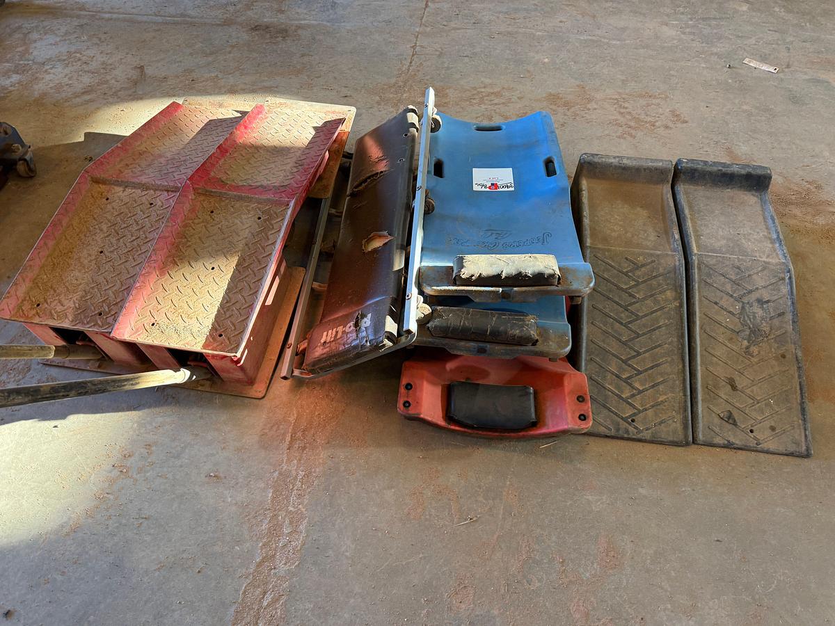 Used (2) WHEELED VEHICLE RAMPS, (2) SMALL RAMPS, (4) CREEPERS