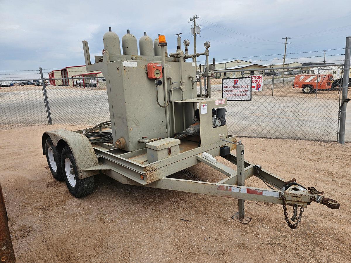Used 2-station closing unit mtd on shopbuilt t/a bumper pull trailer