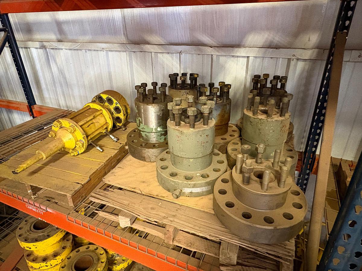 Used (3 shelves) w/ (18) assorted single stud adapters, 5” spacer spools, hydraulic valve actuator & valve stems