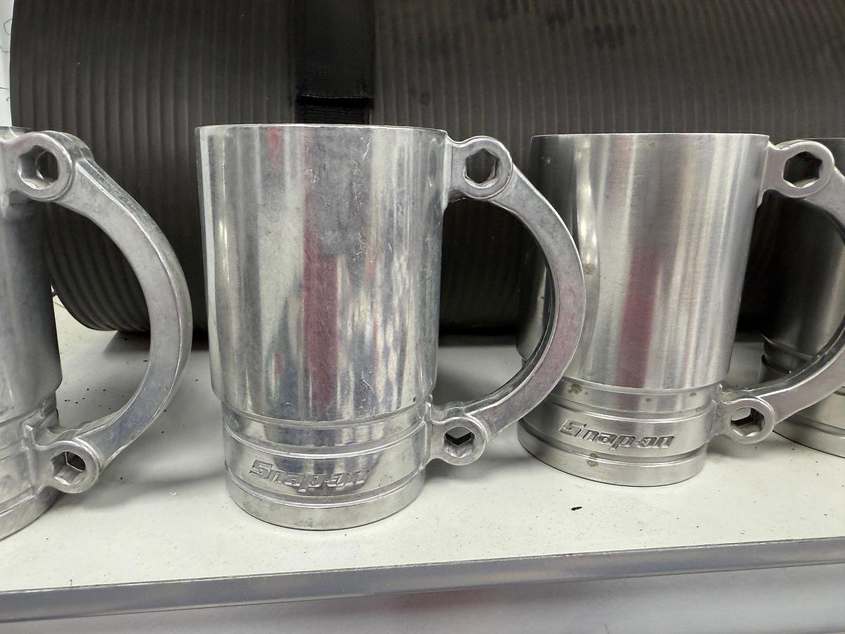 Used 6- SHELVE RACK W/ CONTENTS OF (5) CUSTOM SNAP ON SOCKET CUPS, DRILL BIT SET IN BOX, TOOL BOX, PUTTING TURF, (2) FLOOR JACKS