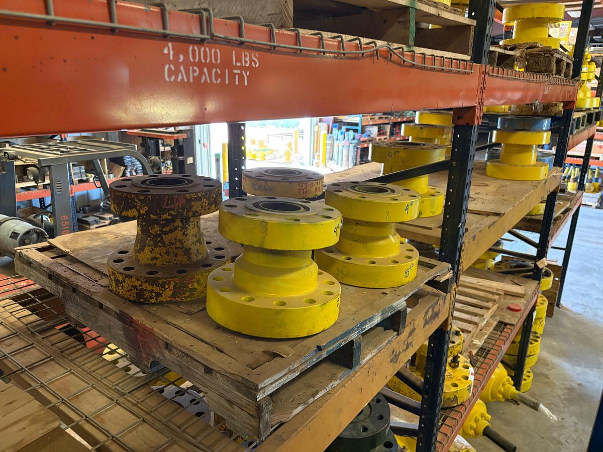Used (4 shelves) w/ assorted 4” to 7” spools, single stud adapters, & 5” 10k blind flanges