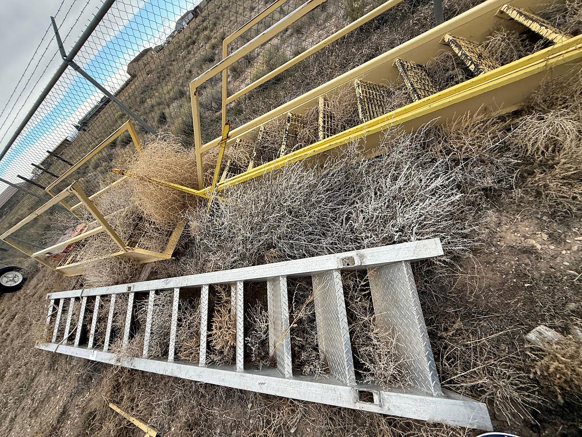 Used (1) 12' EXTENDABLE ALUMINUM, (1) 15' ALUMINUM, & (2) 15' STEEL W/ HAND RAILS RIG LADDERS