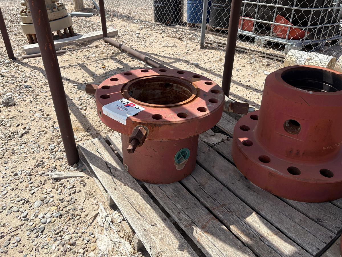 Used (2) 11”5k x 9-5/8” casing heads w/ (2) 11” multi bolt heads