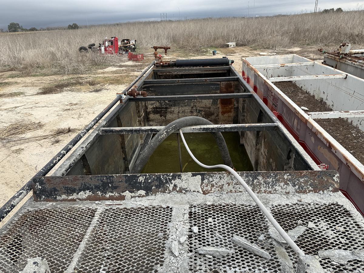 Used 30’ X 8’ X 5’ 4-COMP CEMENT MIXING TANK W/ (2) AGITATORS, CATWALK, & IRON RACK