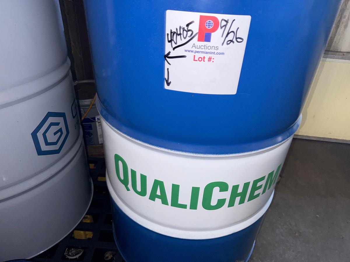 Used SECTION W/ 4- 55 GAL DRUMS & 5-Gal Pails MOSTLY FULL OF MACHINING COOLING LUBRICANTS W/ HAND PUMPS & CATCH PANS