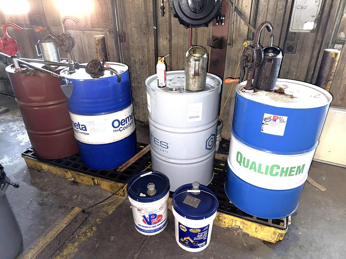Used SECTION W/ 4- 55 GAL DRUMS & 5-Gal Pails MOSTLY FULL OF MACHINING COOLING LUBRICANTS W/ HAND PUMPS & CATCH PANS