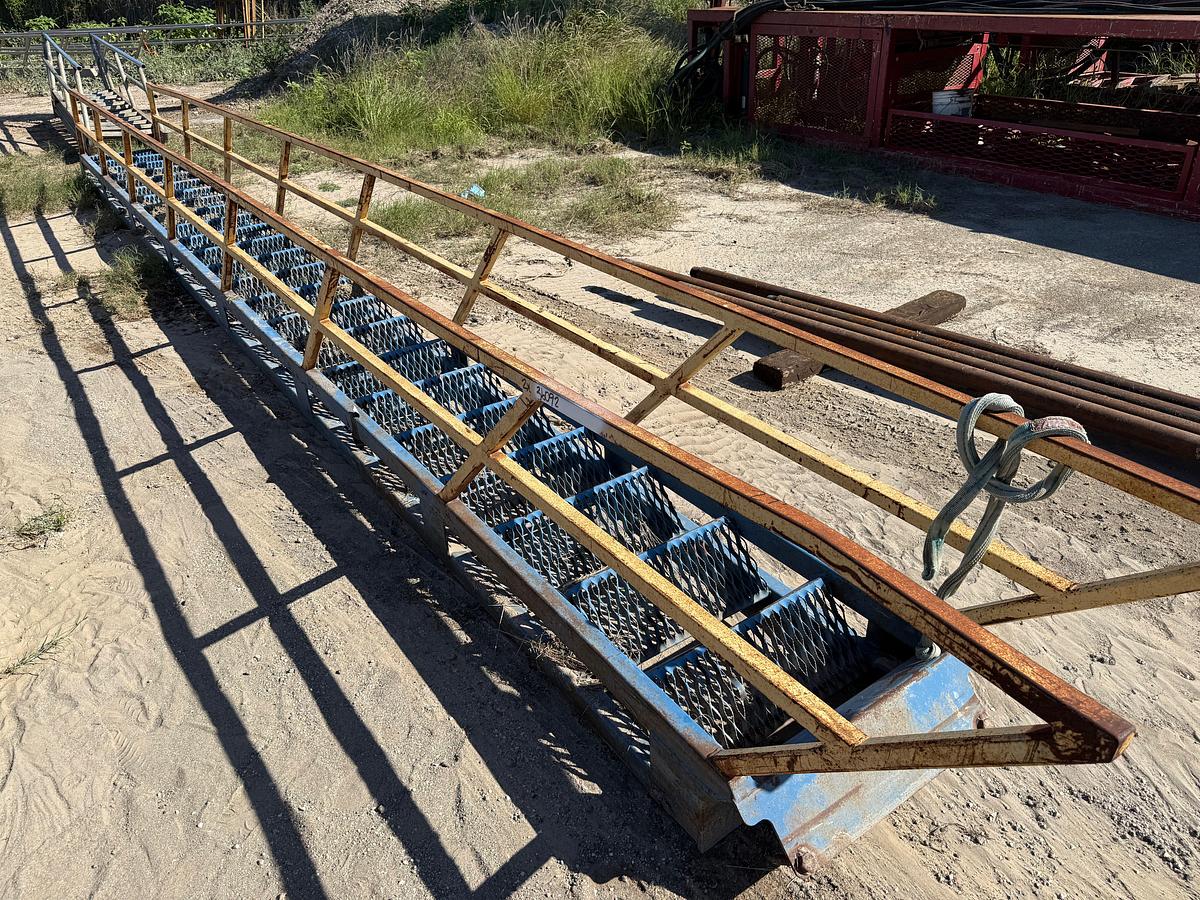 Used (2) 27’ STEEL RIG LADDERS