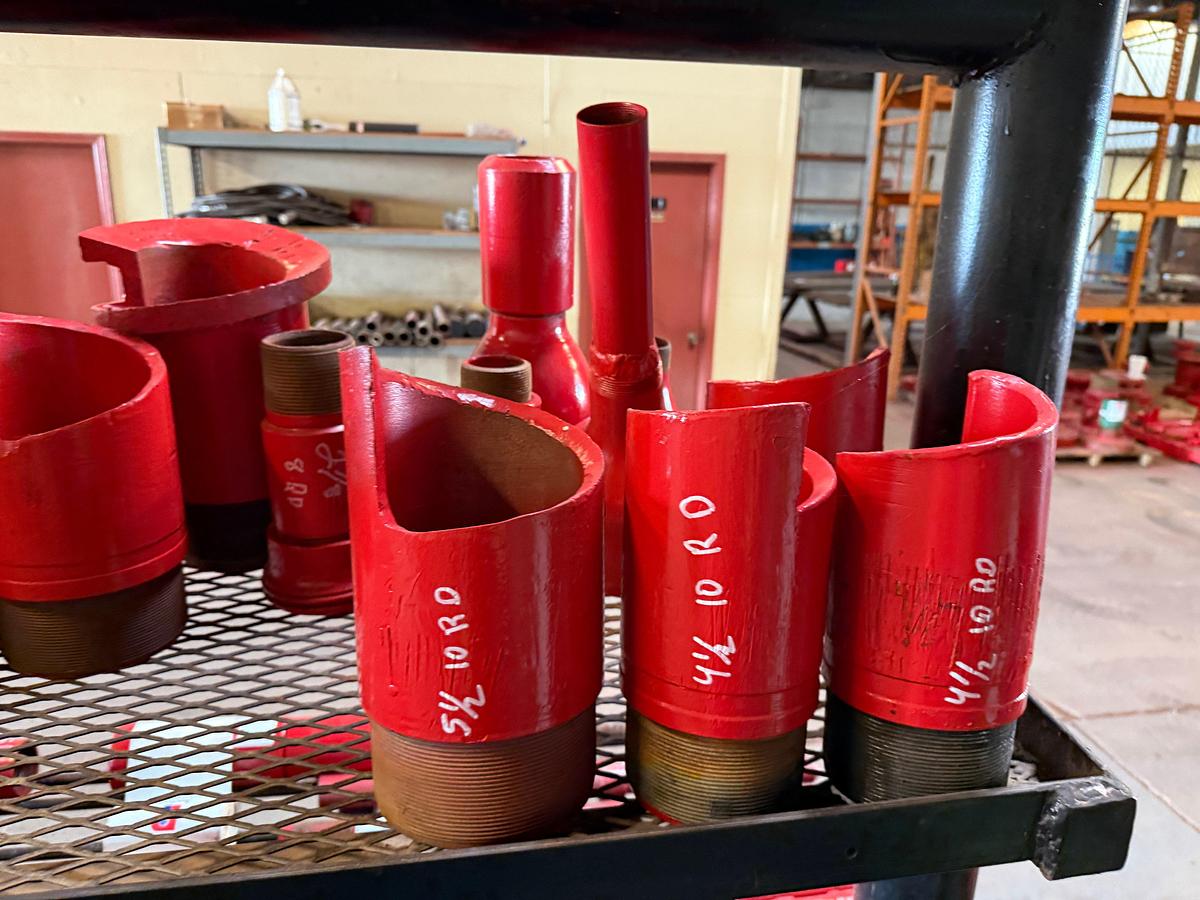 Used TOP RACK SHELF OF (30+) OVERSHOT CUT LIP GUIDES, SWAGES, COLLARS, SOME BOWLS & TOP SUBS